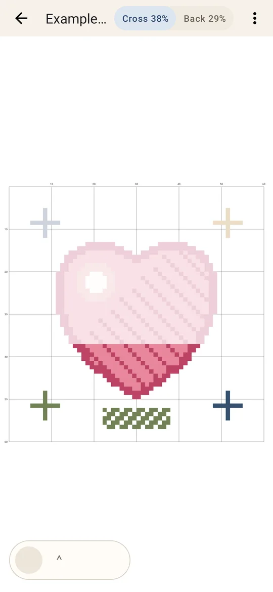 Zoomed-out example chart: a heart, with finished stitches filled in their floss colours